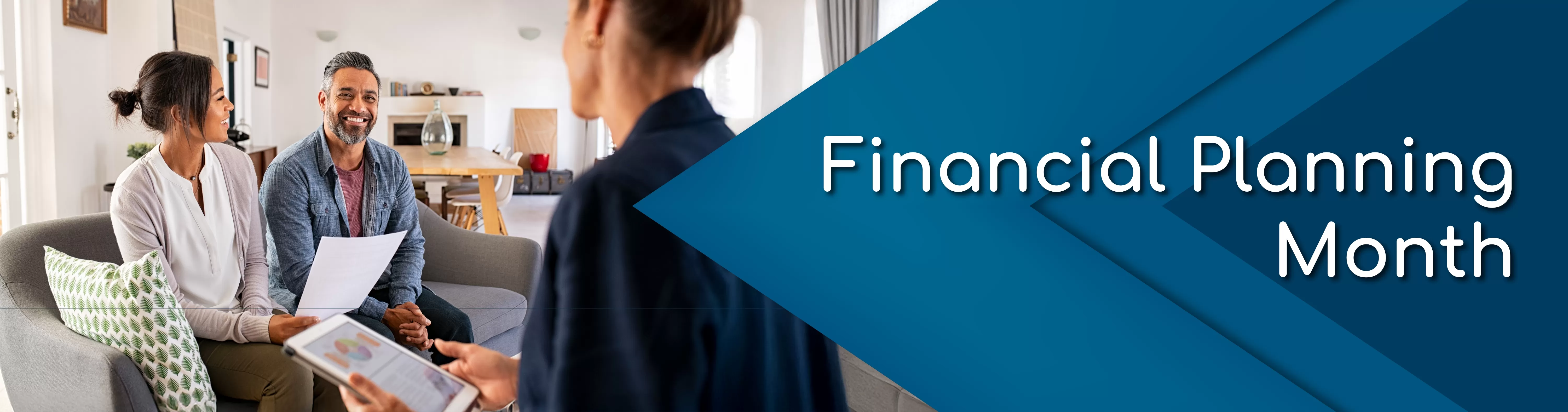 Couple sitting down with financial consultant